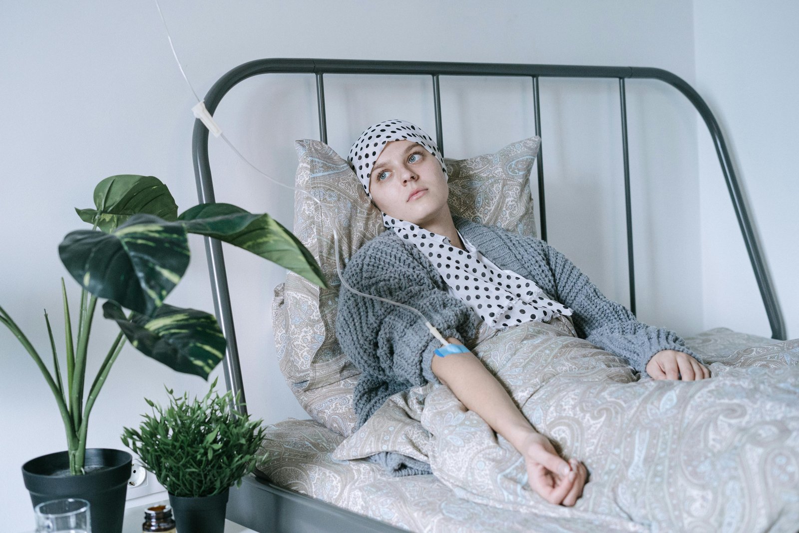 A young woman in recovery, embracing strength and hope during cancer therapy.